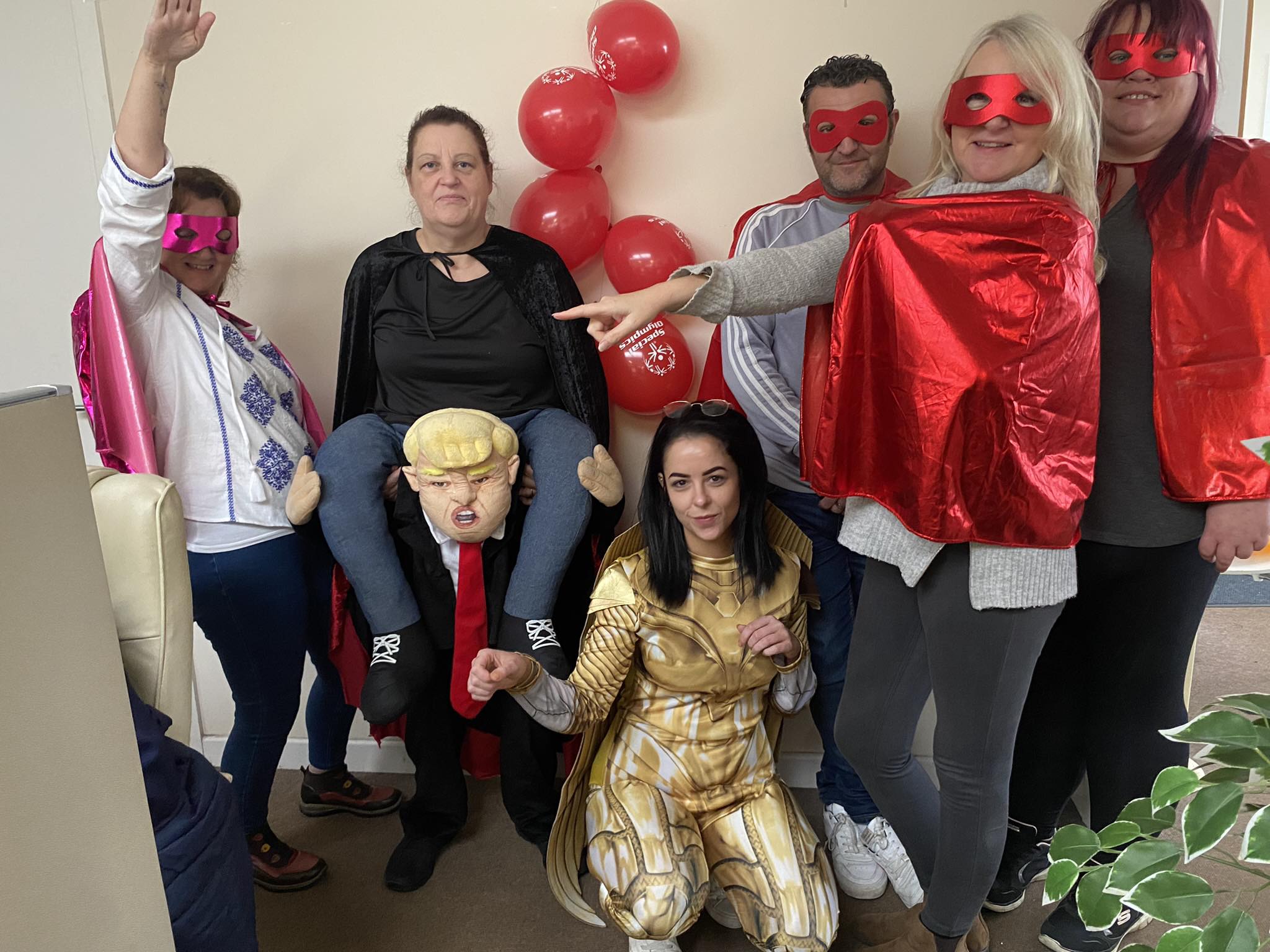ContactCentre.ie staff posing beside Special Olympics Ireland balloons